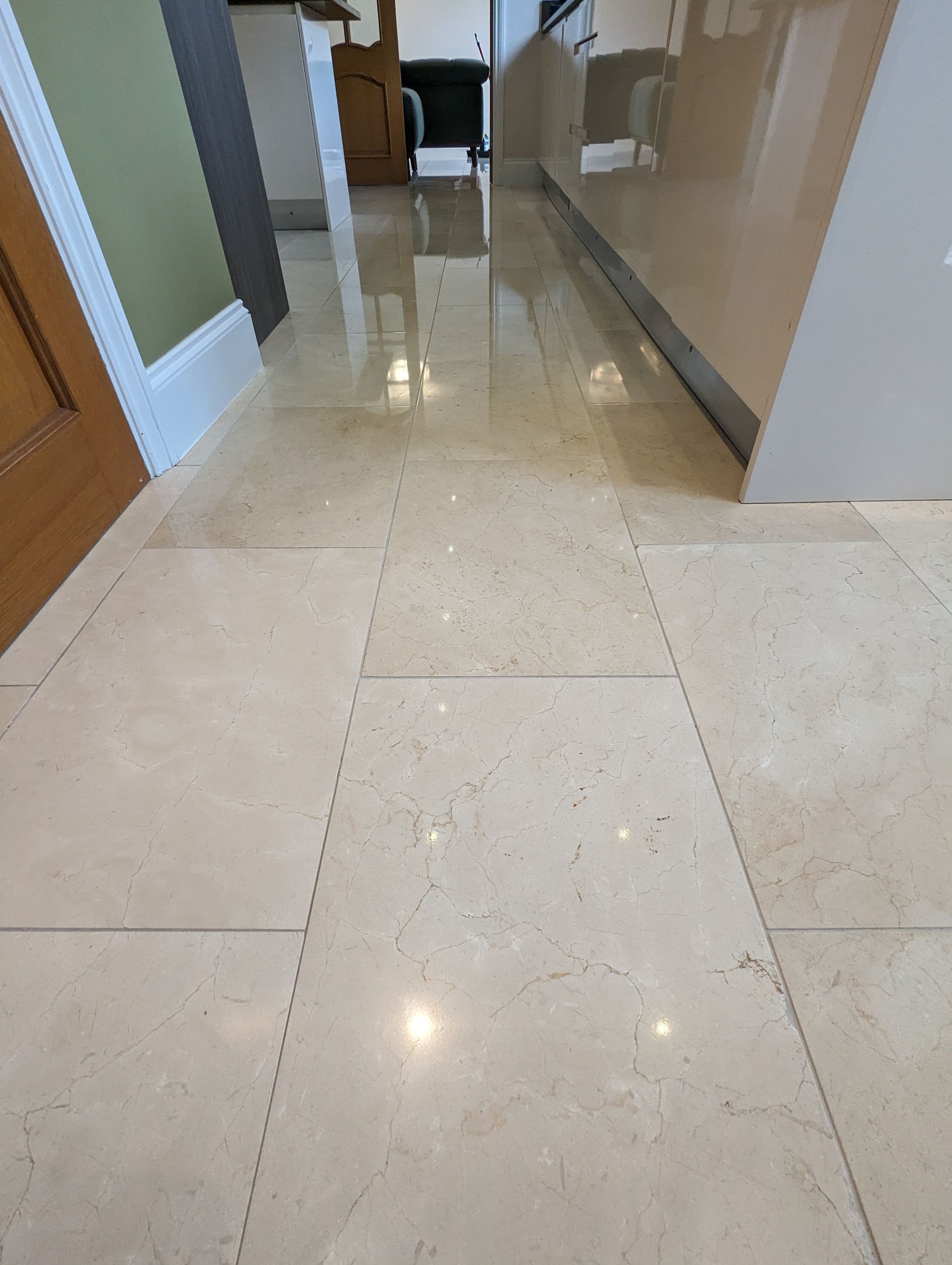 Marble floor deep cleaning, polishing, sealing and grout cleaning in Greater Manchester. Filling in holes with a resin filler.