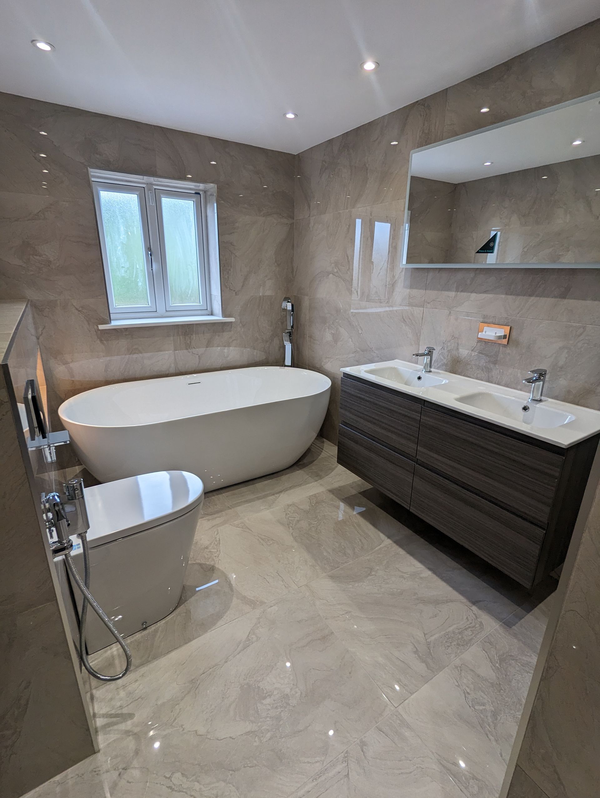 Bathroom Refurbishment tiles and grout cleaning in Stockport. Silicone sealant replacement.