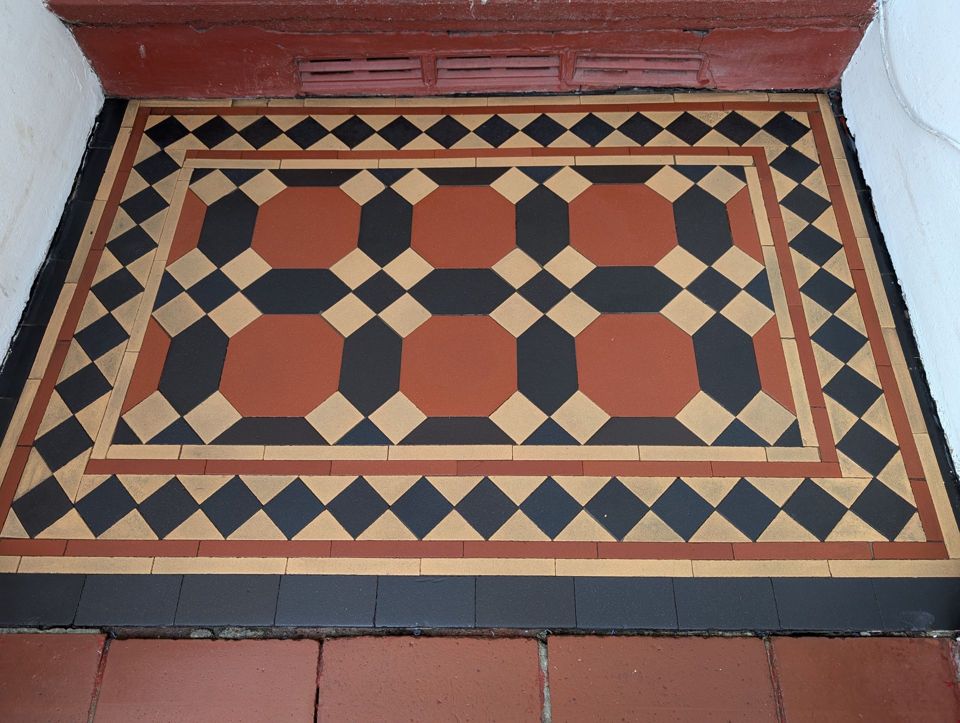 Victorian tiled porch floor restoration deep cleaning sealing in Chorlton, Greater Manchester. We are based in Hindley, Wigan, but cover also Liverpool, Lancashire and Derbyshire areas. Photo done after restoration. 