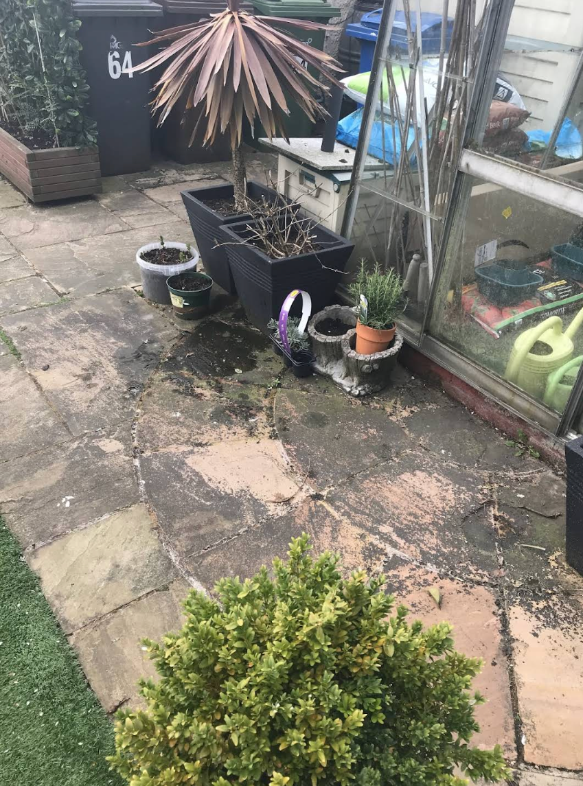 Indian Sandstone patio full restoration - deep cleaning, regrouting and sealing in Greater Manchester.