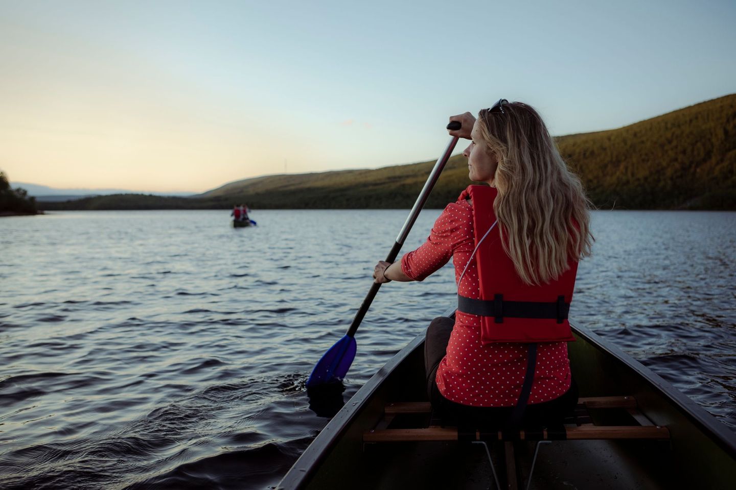 Water activities in Lapland, SUP-board and canoe and swimming.