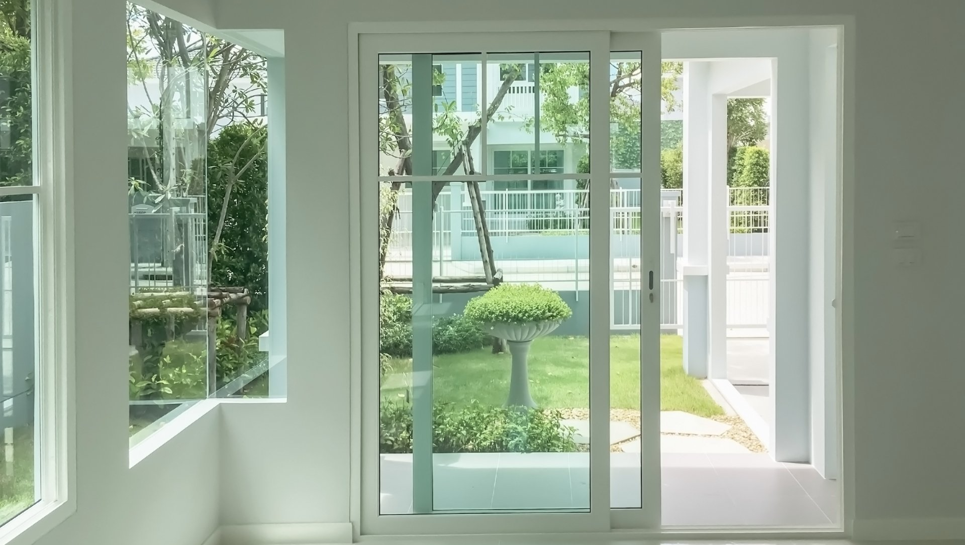 sliding door and glass windows looking through the patio