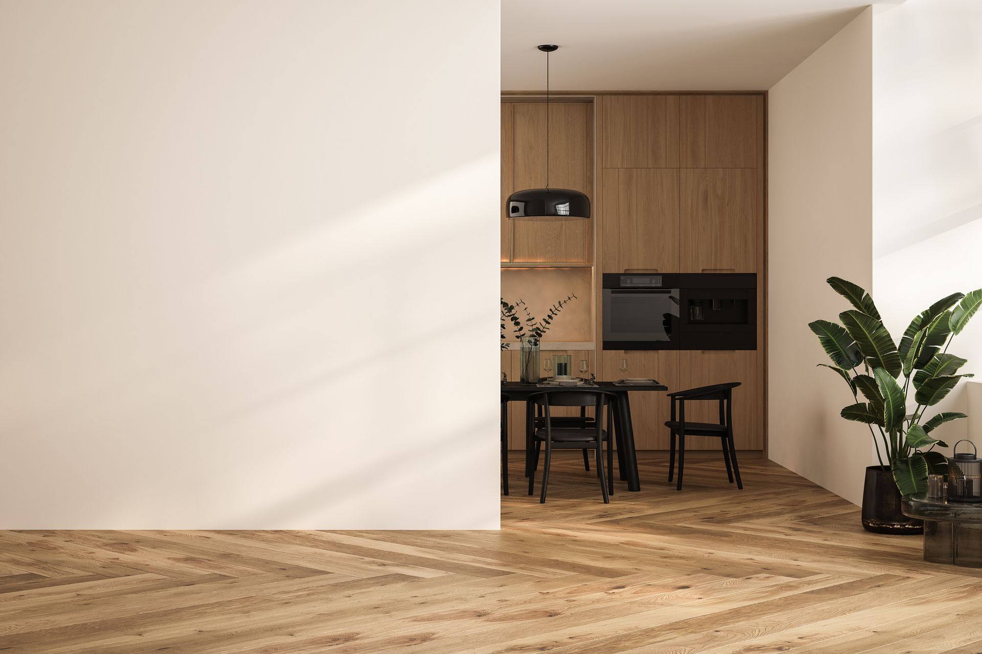 Minimalist dining area with wood flooring, white walls, and a black table in a kitchen nook. Minimalist dining area with wood flooring, white walls, and a black table in a kitchen nook.