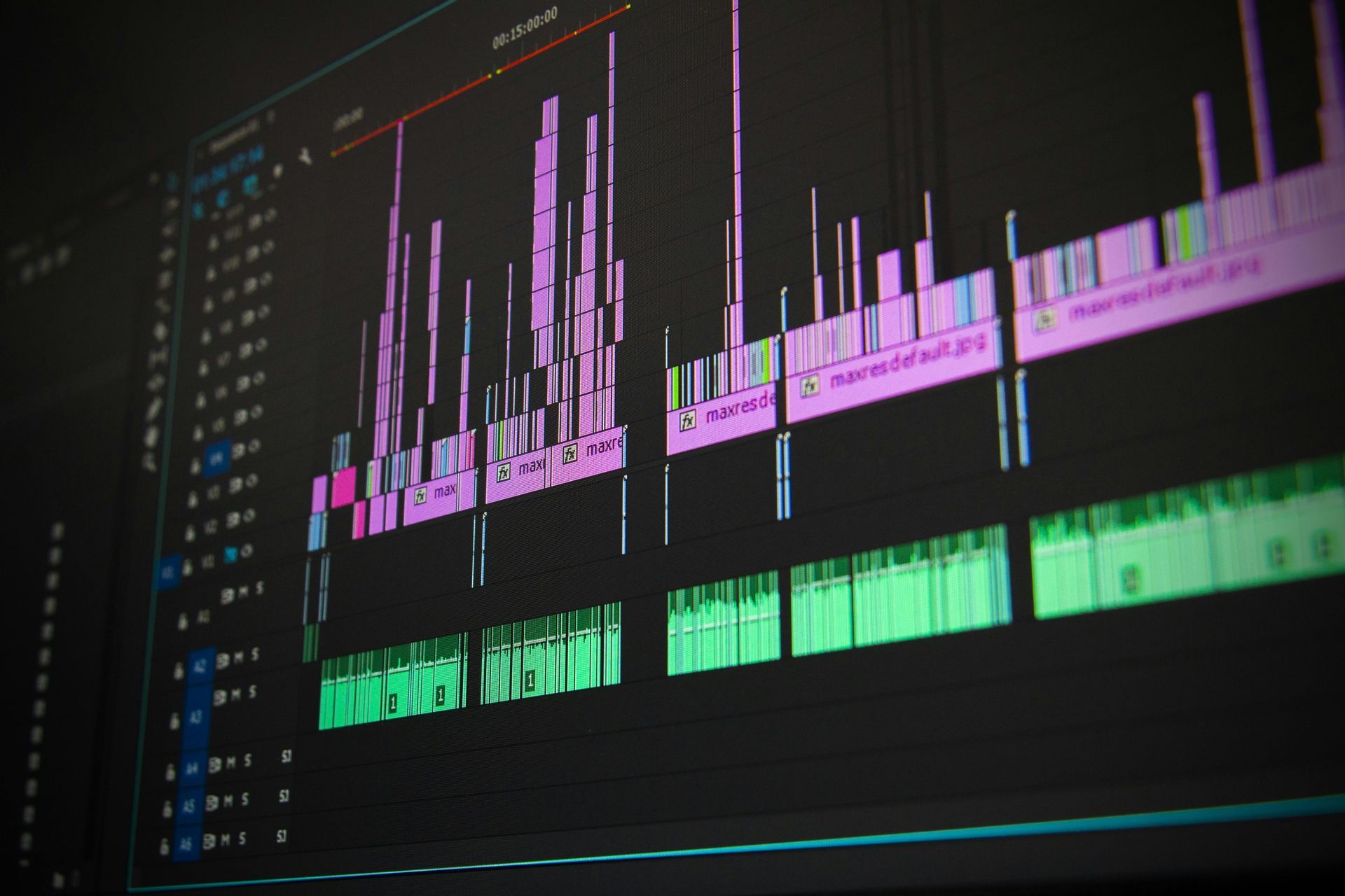 The post-production process of video editing a corporate film on a professional software timeline.