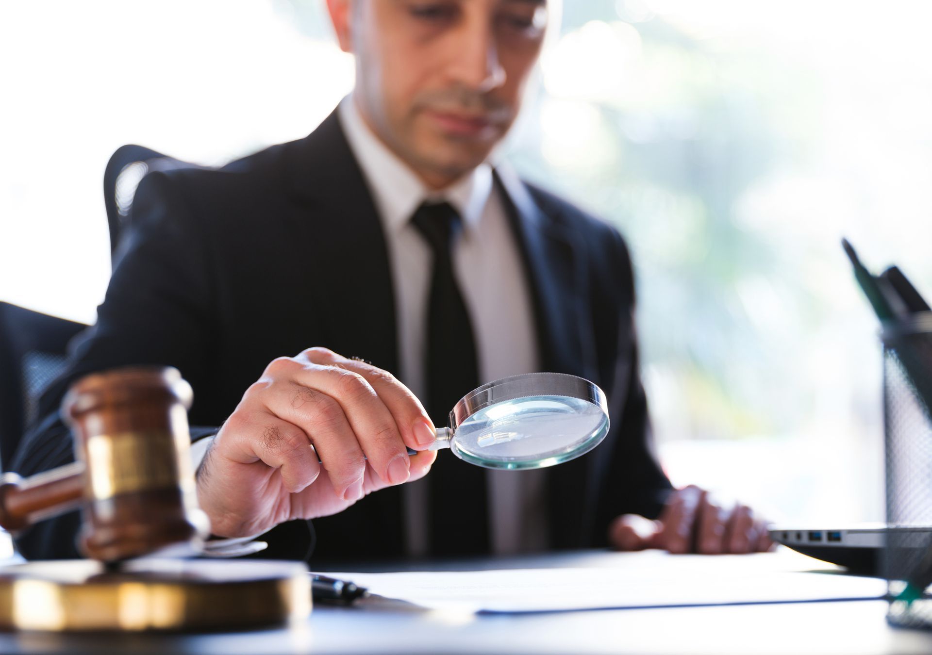 Man Magnifying Paper - Defiance, Ohio | E. Charles Bates Attorney Man Magnifying Paper - Defiance, Ohio | E. Charles Bates Attorney