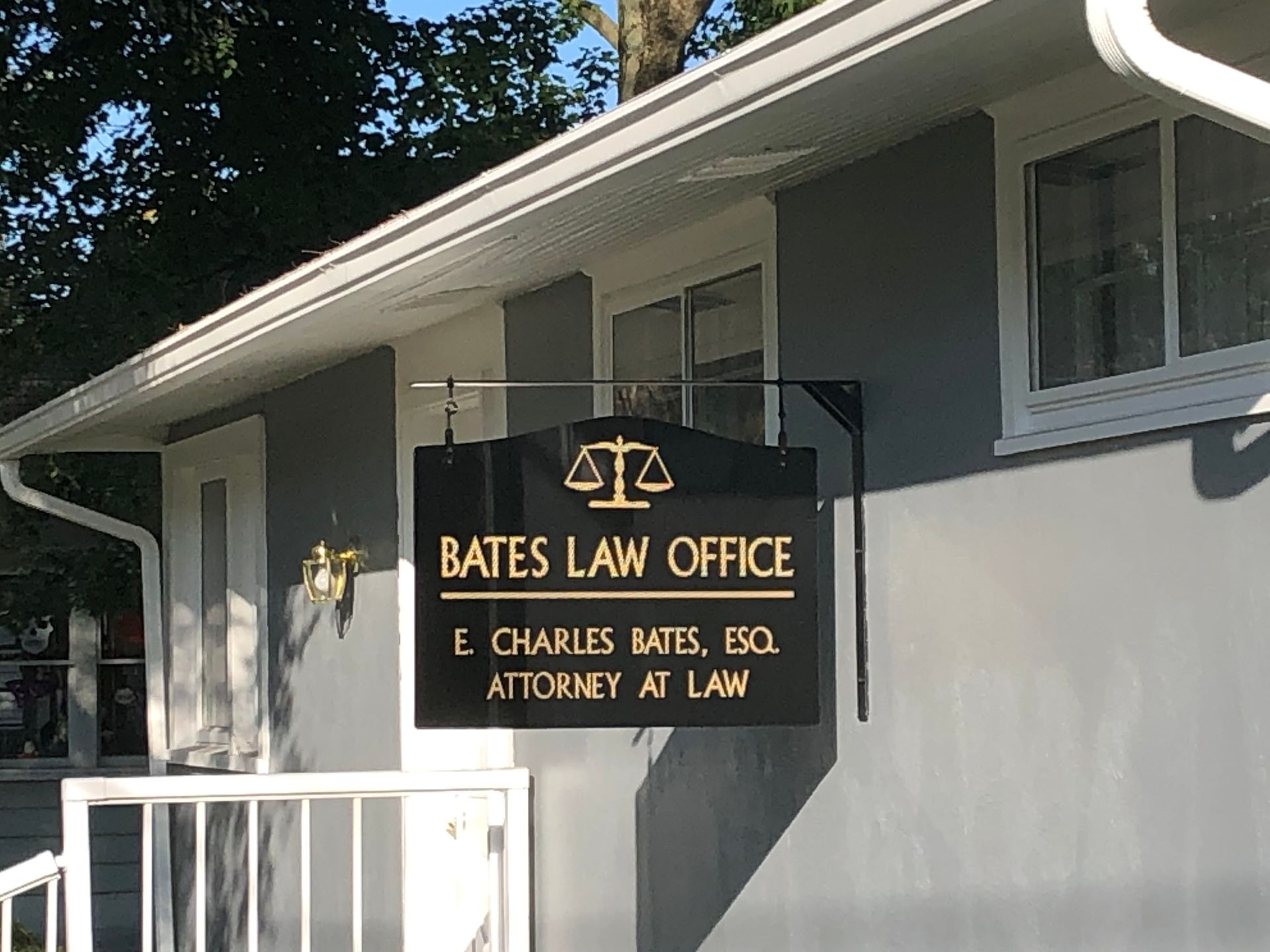 Man Magnifying Paper - Defiance, Ohio | E. Charles Bates Attorney Man Magnifying Paper - Defiance, Ohio | E. Charles Bates Attorney