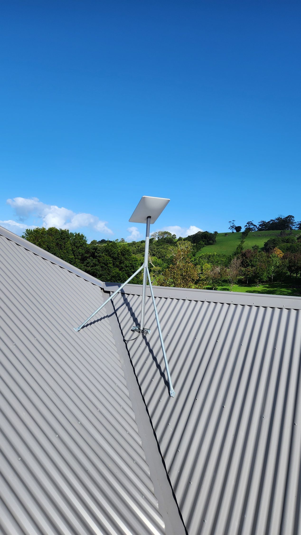 A Roof With A View Of The Ocean And A Rainbow In The Sky — Boardman's TV Antennas in Basin View, NSW
