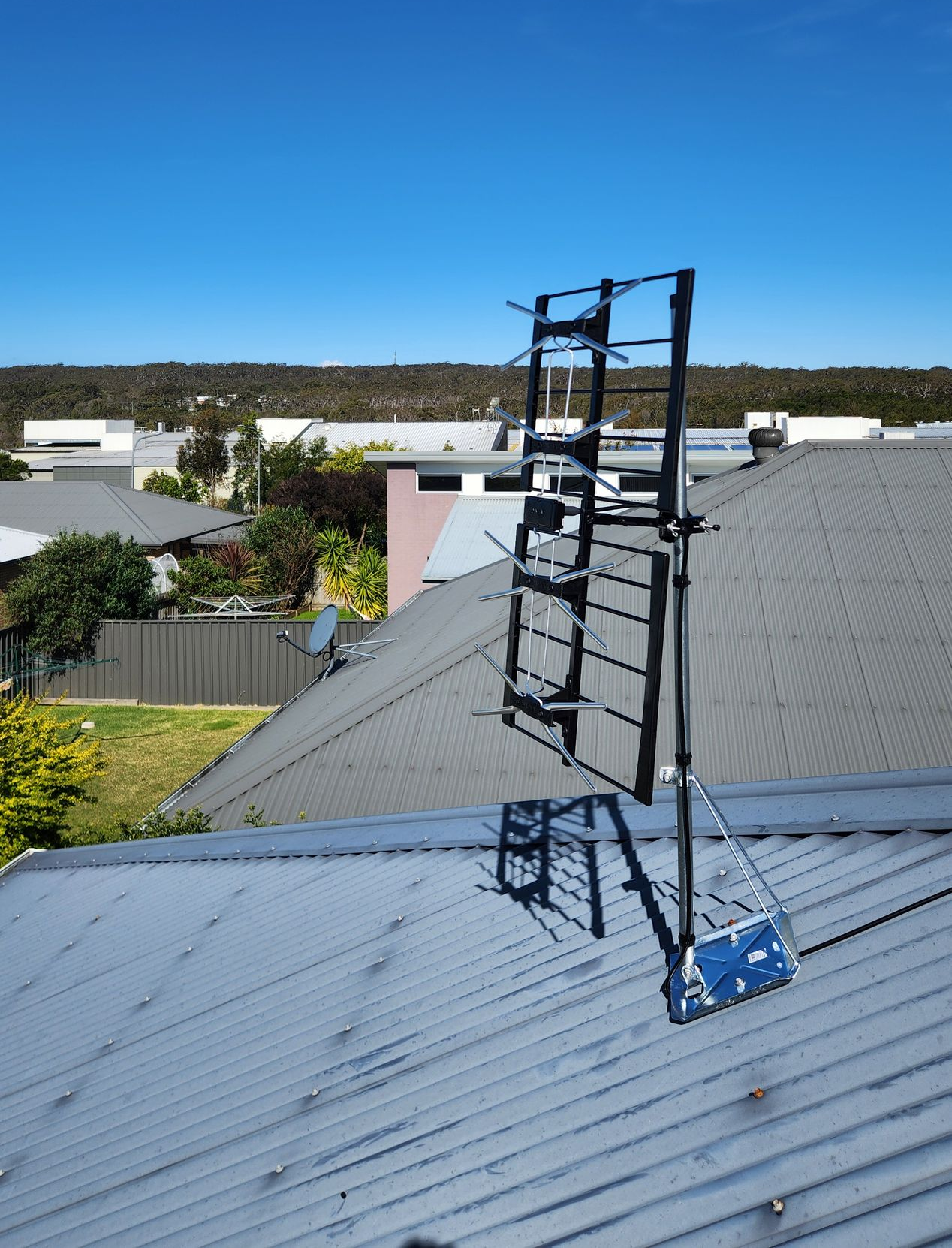 A Large Antenna Is Sitting On Top Of A Roof — Boardman's TV Antennas in Basin View, NSW