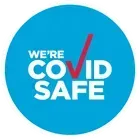 Blue circular badge reading “WE’RE COVID SAFE” with a red check mark.