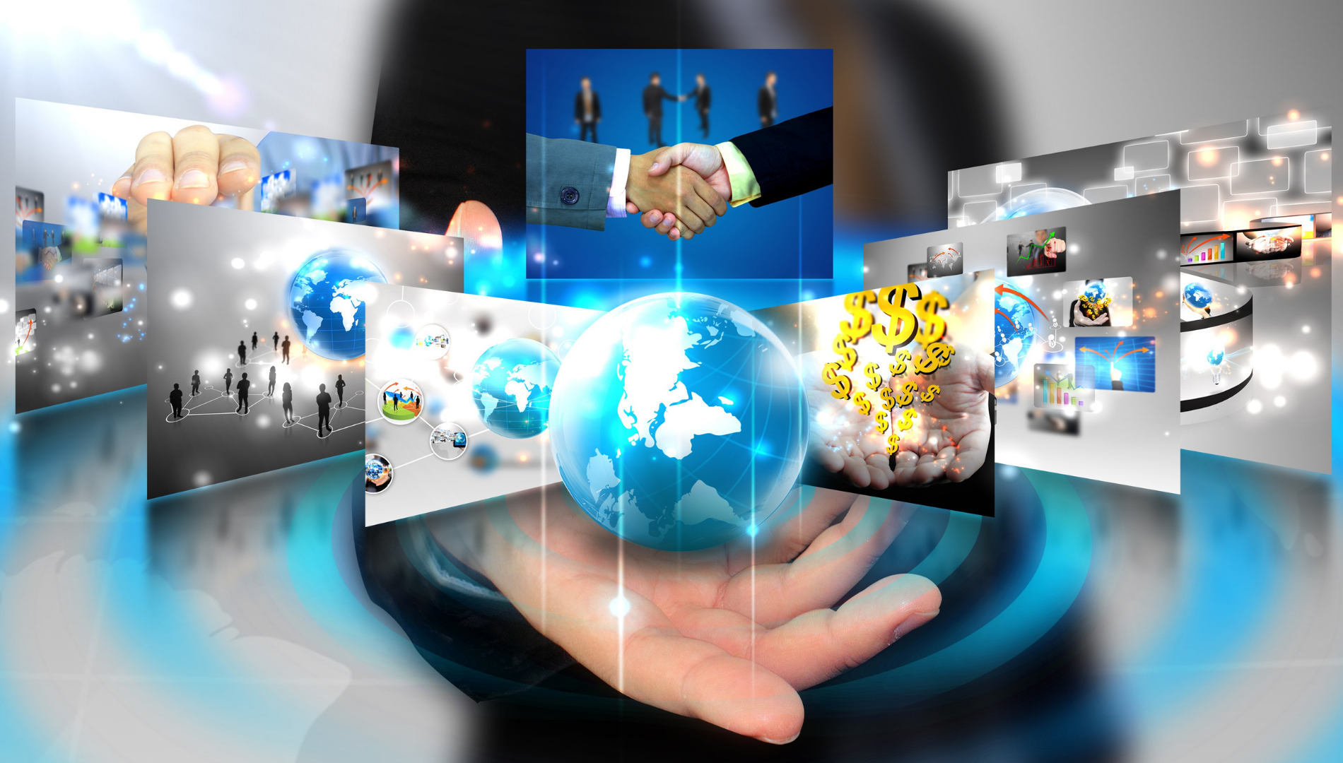 Person holding glowing globe, surrounded by digital screens of business and global images.
