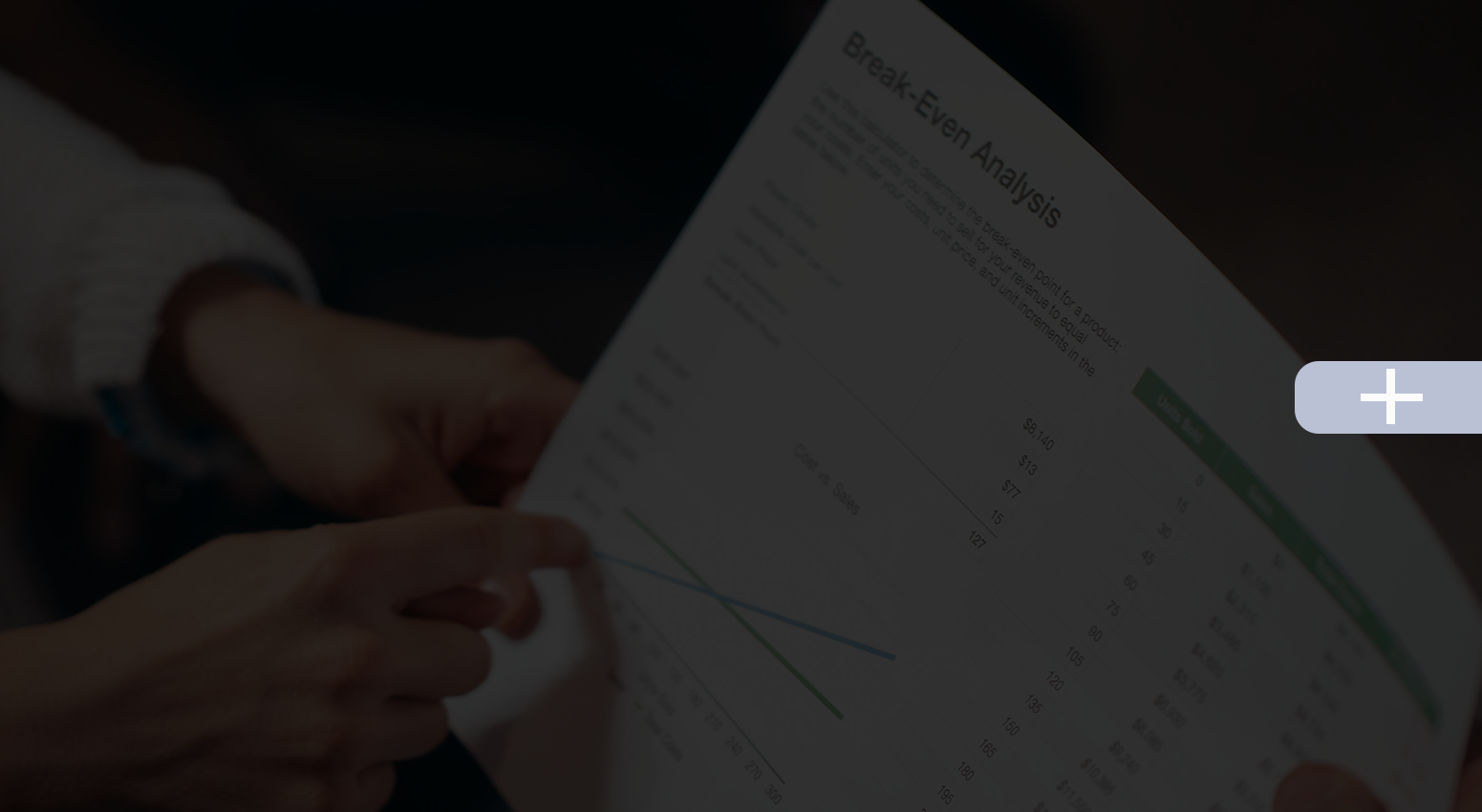 Person pointing at a document, with text and a line graph.