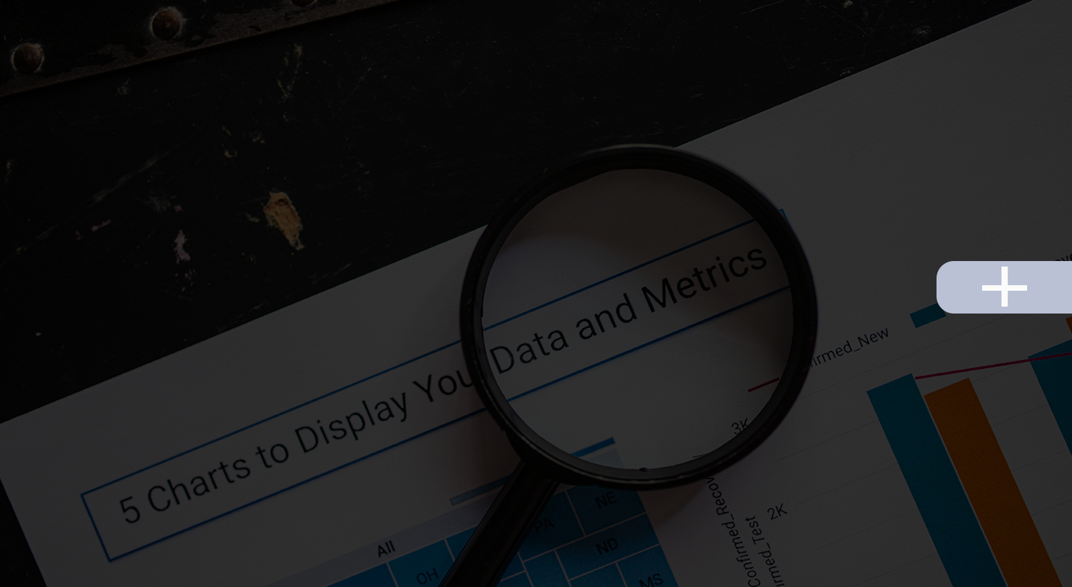Magnifying glass over a chart titled 