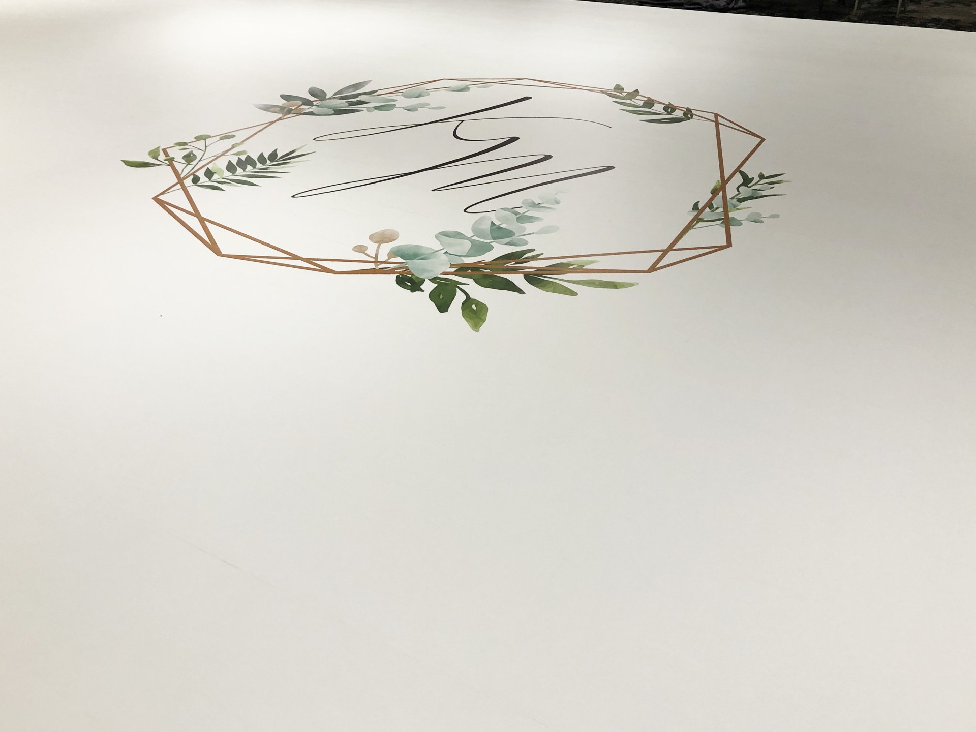 A white plate with a floral design on it