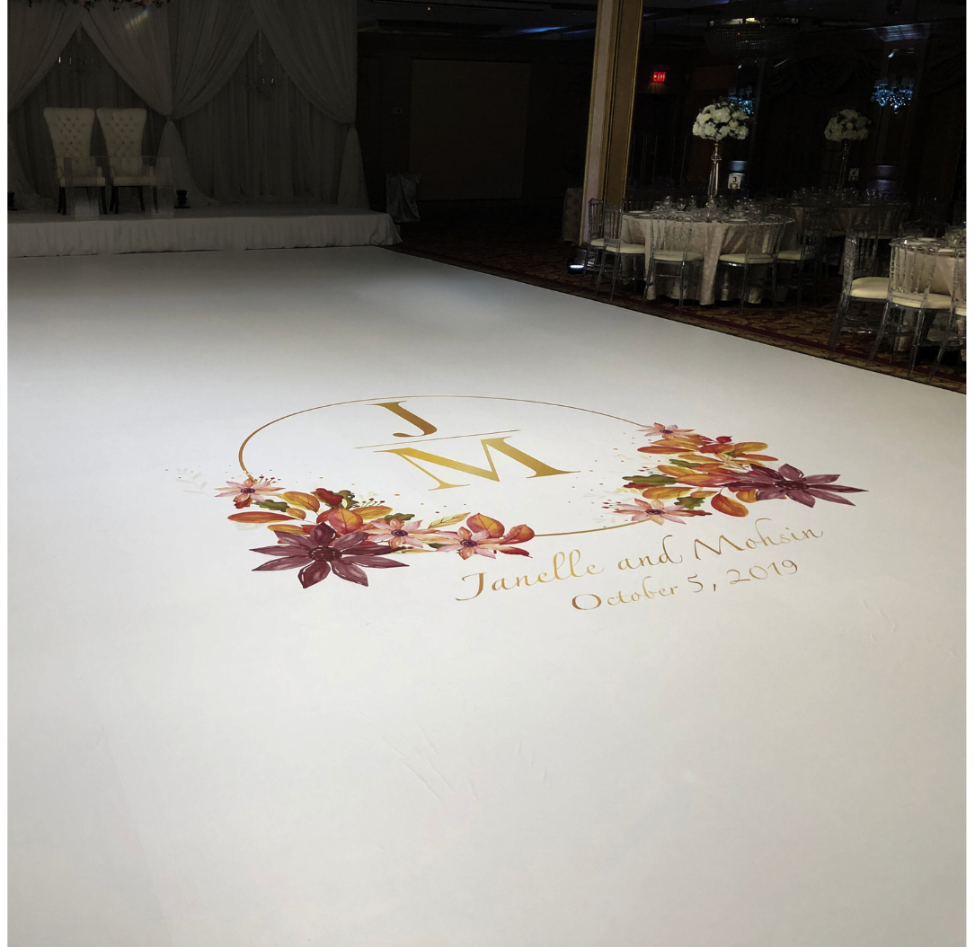 A white dance floor with a wedding logo on it