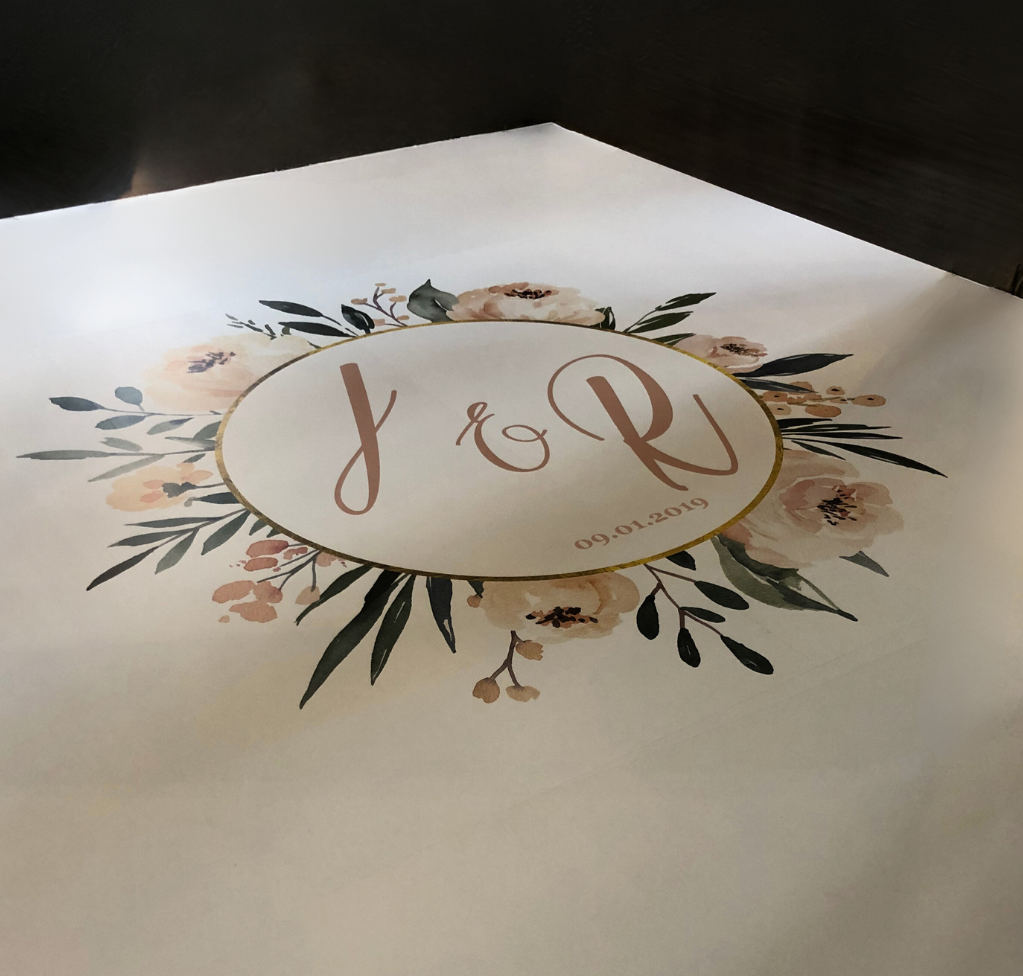 The letters j and p are in a circle with flowers