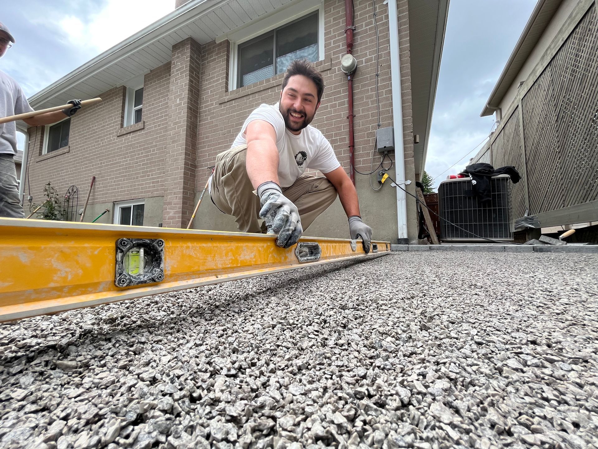 worker using a level tool