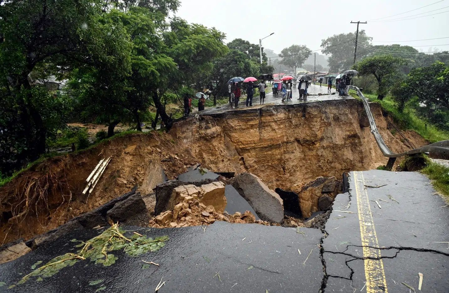 A road connecting two cities was literally torn apart as tropical Cyclone Freddy went through it.
