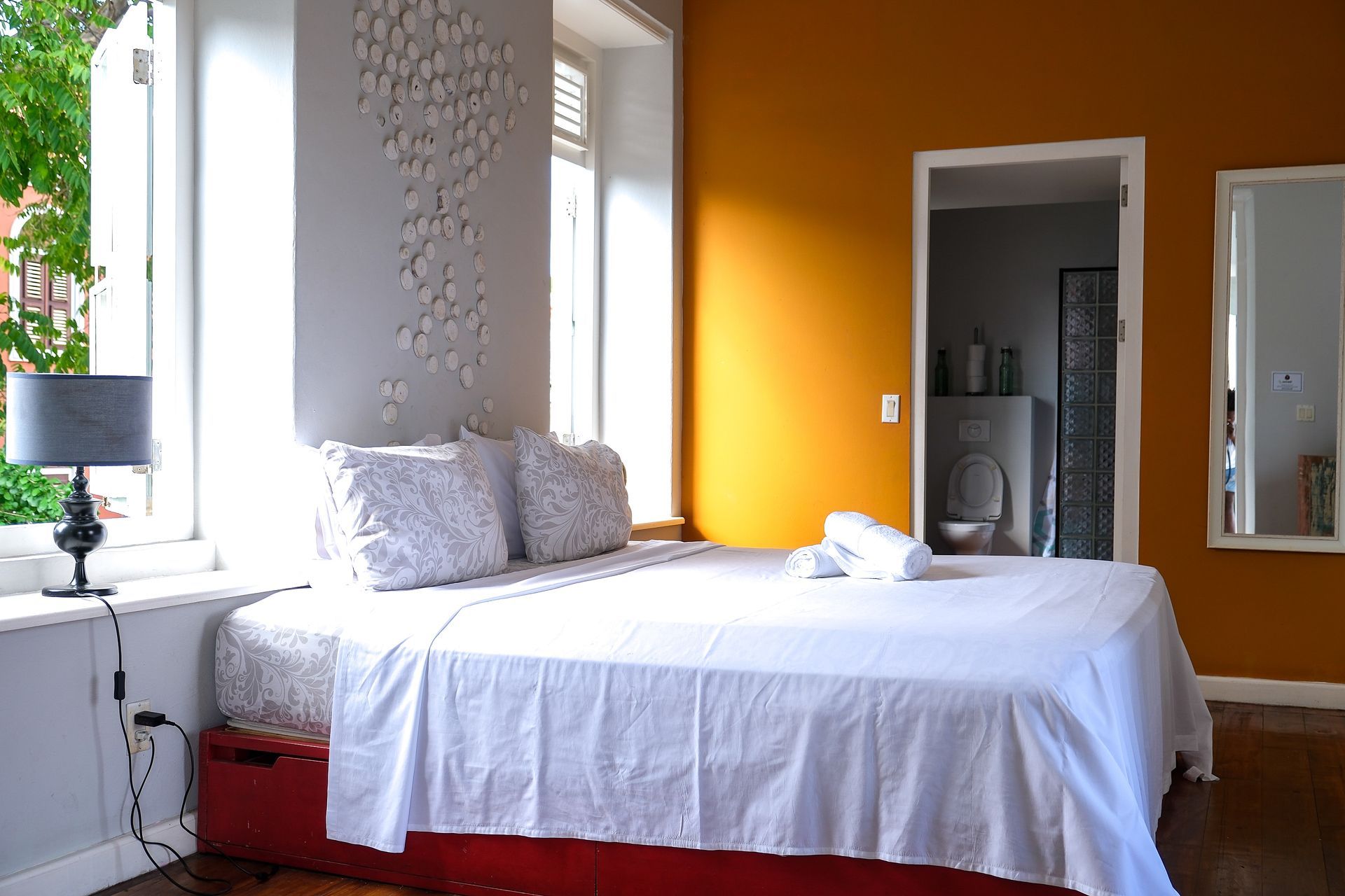 Elegant bedroom in the luxurious one-bedroom apartment at Bario Hotel, refined island comfort in Otrobanda