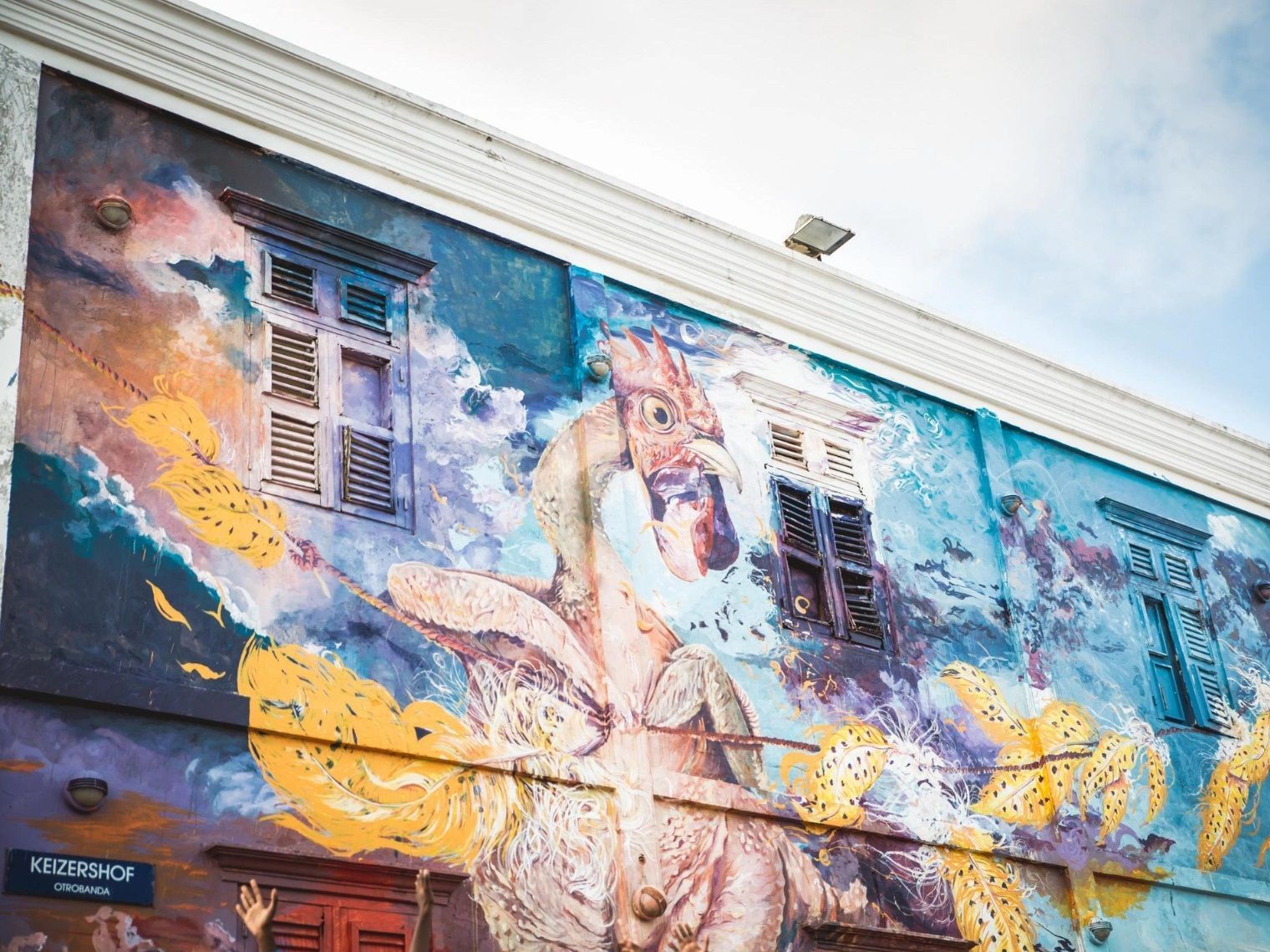 Local street art and creative expression in the Otrobanda neighborhood of Curaçao near Bario Hotel