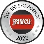 Circular “Top 100 P/C Agency” Insurance Journal 2022 award badge in black, red, and silver.