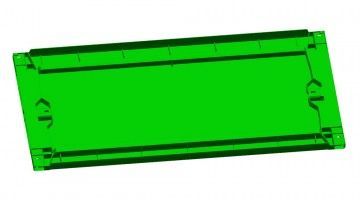 A green rectangular object is sitting on top of a white surface.