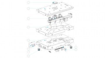 A black and white drawing of a device being disassembled.
