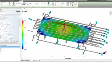 A computer screen shows a model of a building.