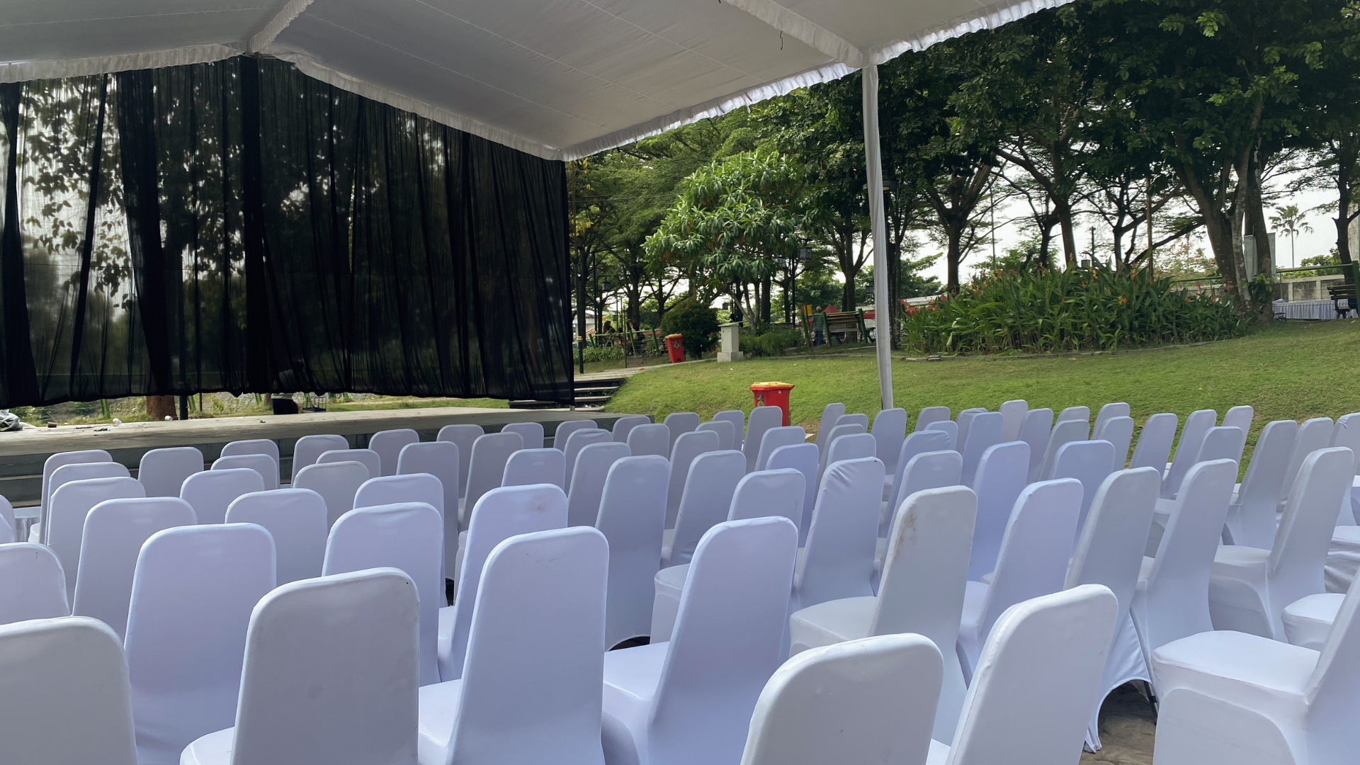 Close-up of venue seating and staging setup during inspection