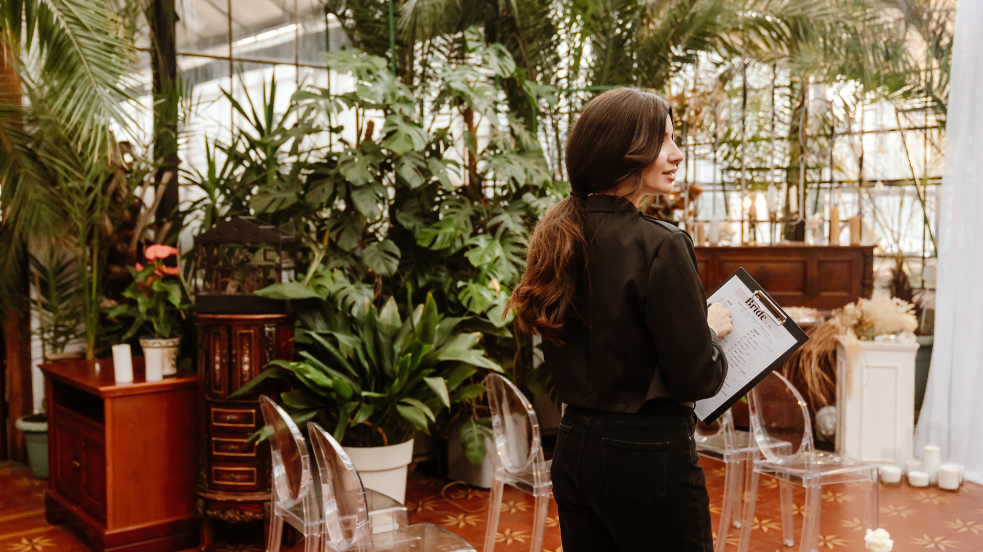 Client site inspection at an event venue with planner and client reviewing space