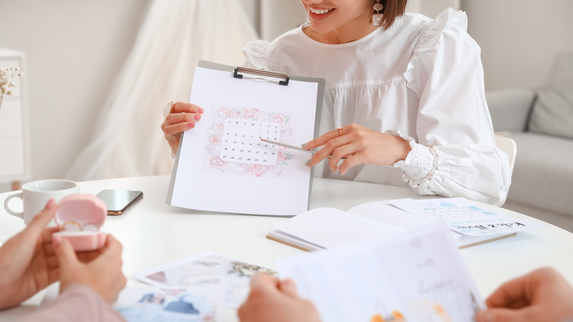 Event planner walking clients through venue layout during inspection