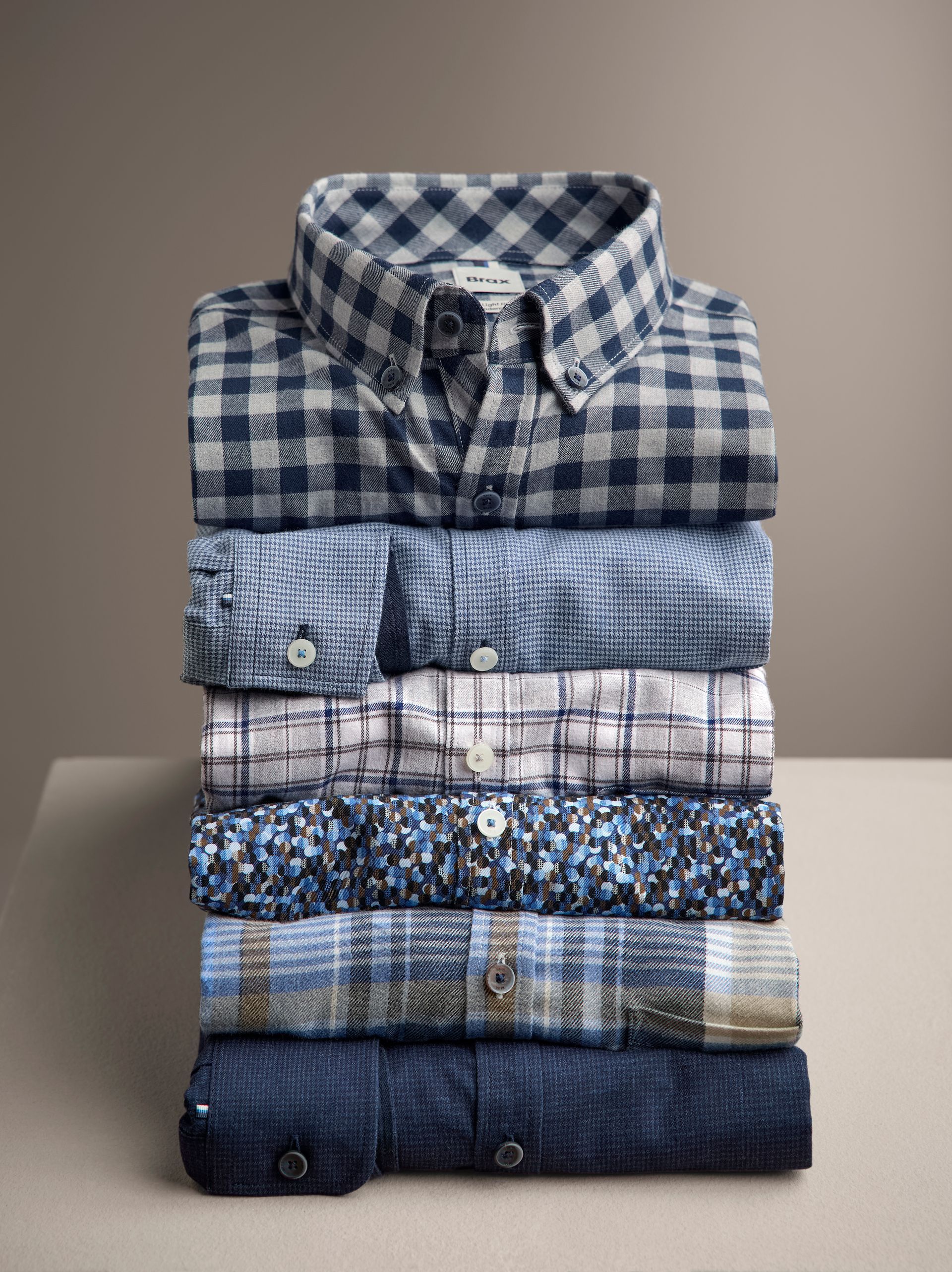 mens button down shirts stacked