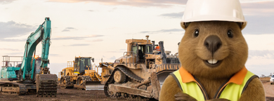 Bear mascot in a hard hat and safety vest at a construction site with excavators and bulldozers.