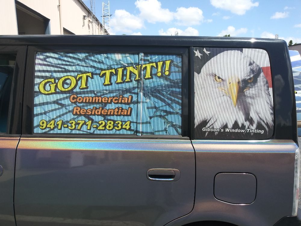 Commercial pest control van with “GOT TIKI!” and a bald eagle graphic on the side.