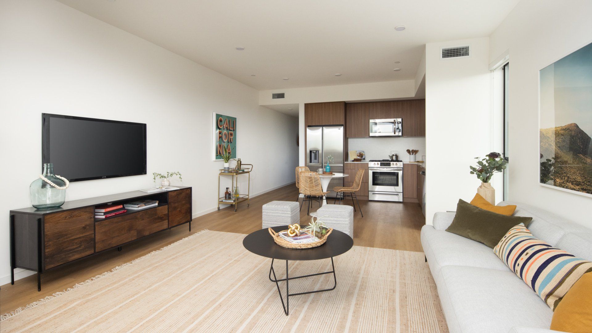 Open-concept living space with modern finishes and natural light in 1-bedroom unit