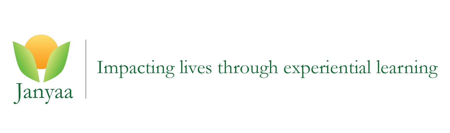 Janyaa logo with green-orange leaf icon and tagline “Impacting lives through experiential learning”