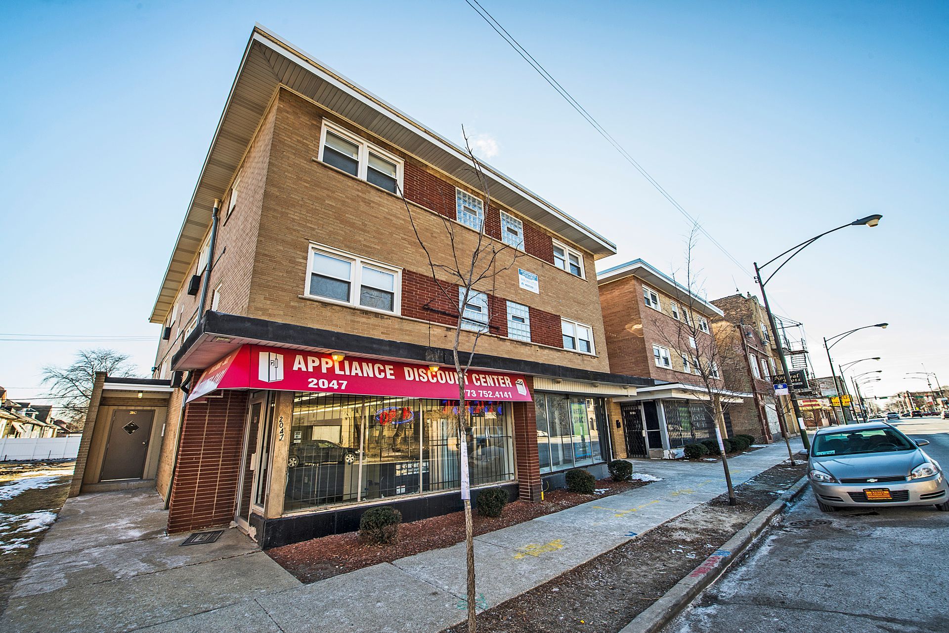 Apartment building with storefront,