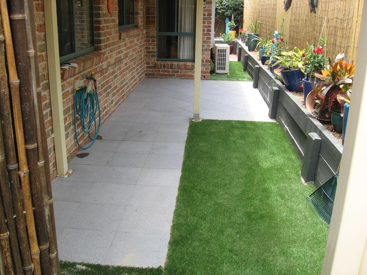 A Patio With a Hose on the Side of It — Seascapes Landscape Construction in Kendall, NSW