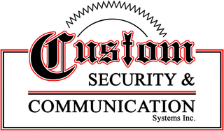 Logo for "Custom Security & Communication," featuring bold text and a stylized sunburst.