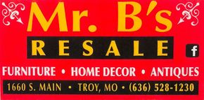 A red sign for mr. b 's resale furniture home decor antiques