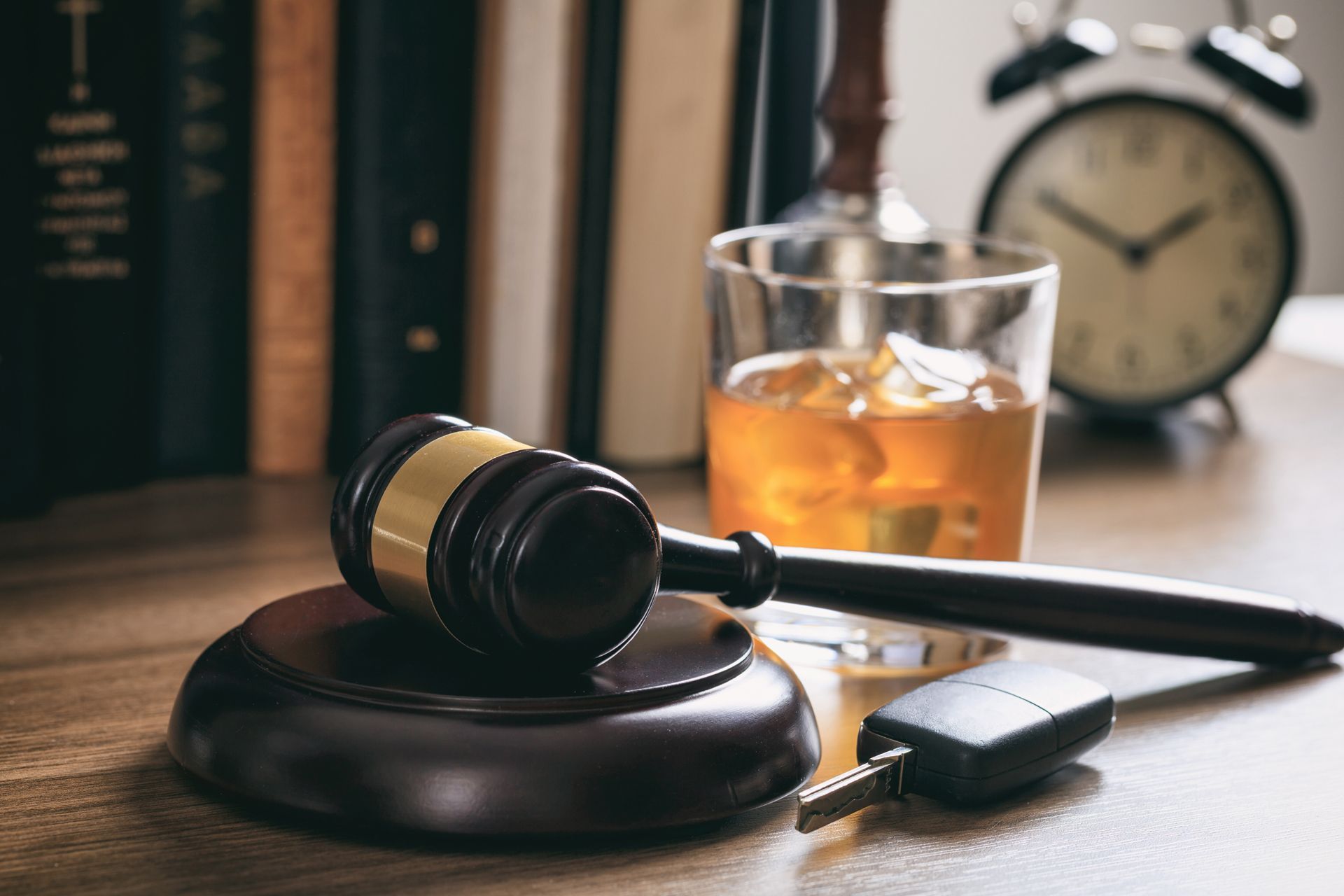 Gavel, Car Key Fob and Alcohol