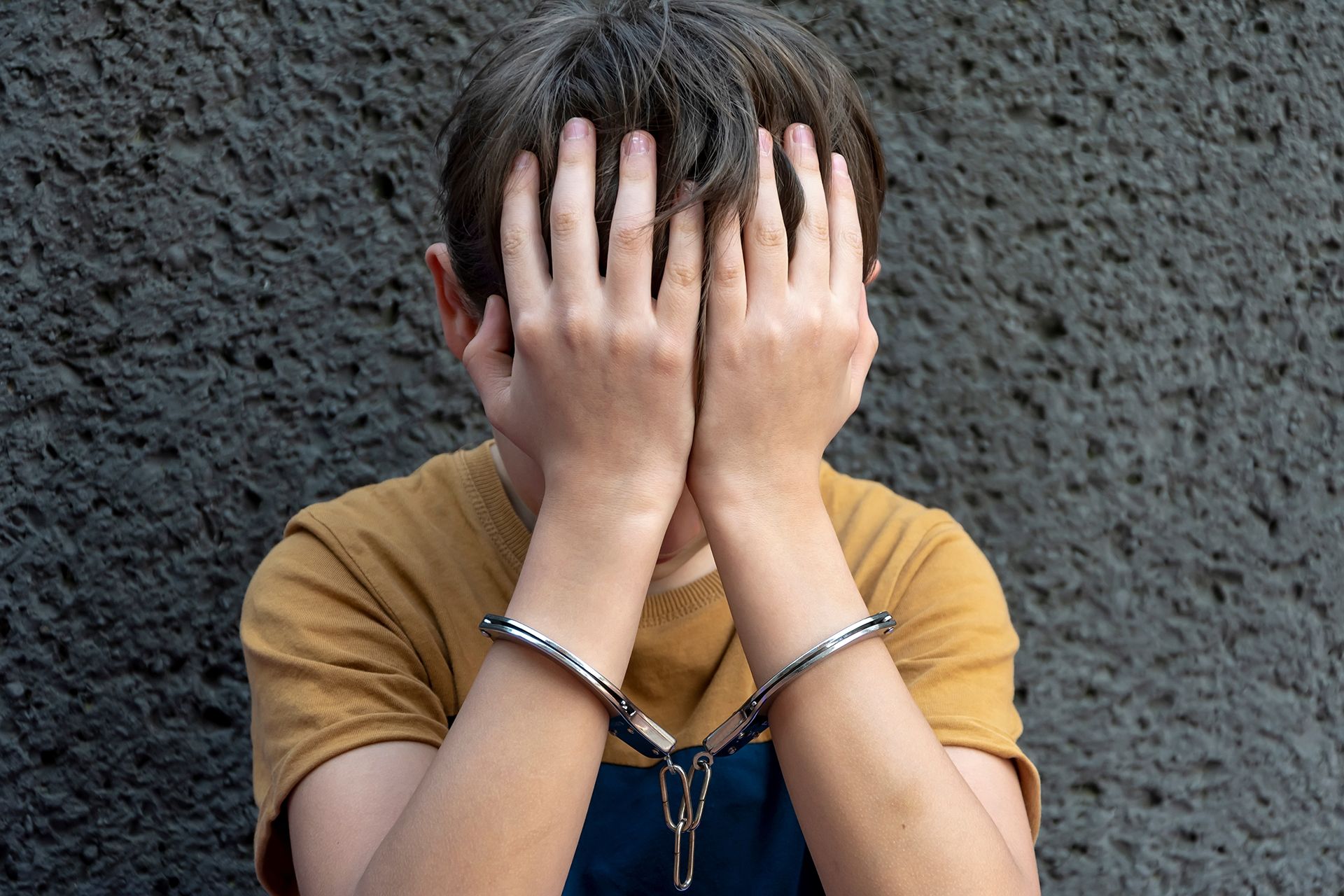 Little Boy With Handcuffs