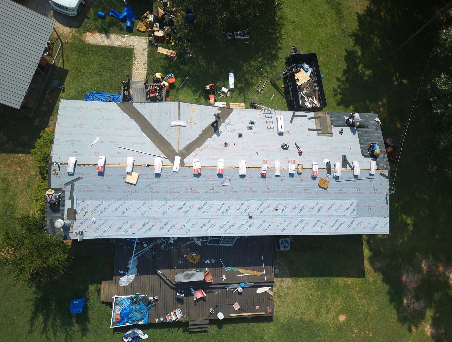 An aerial view of a house that is being remodeled