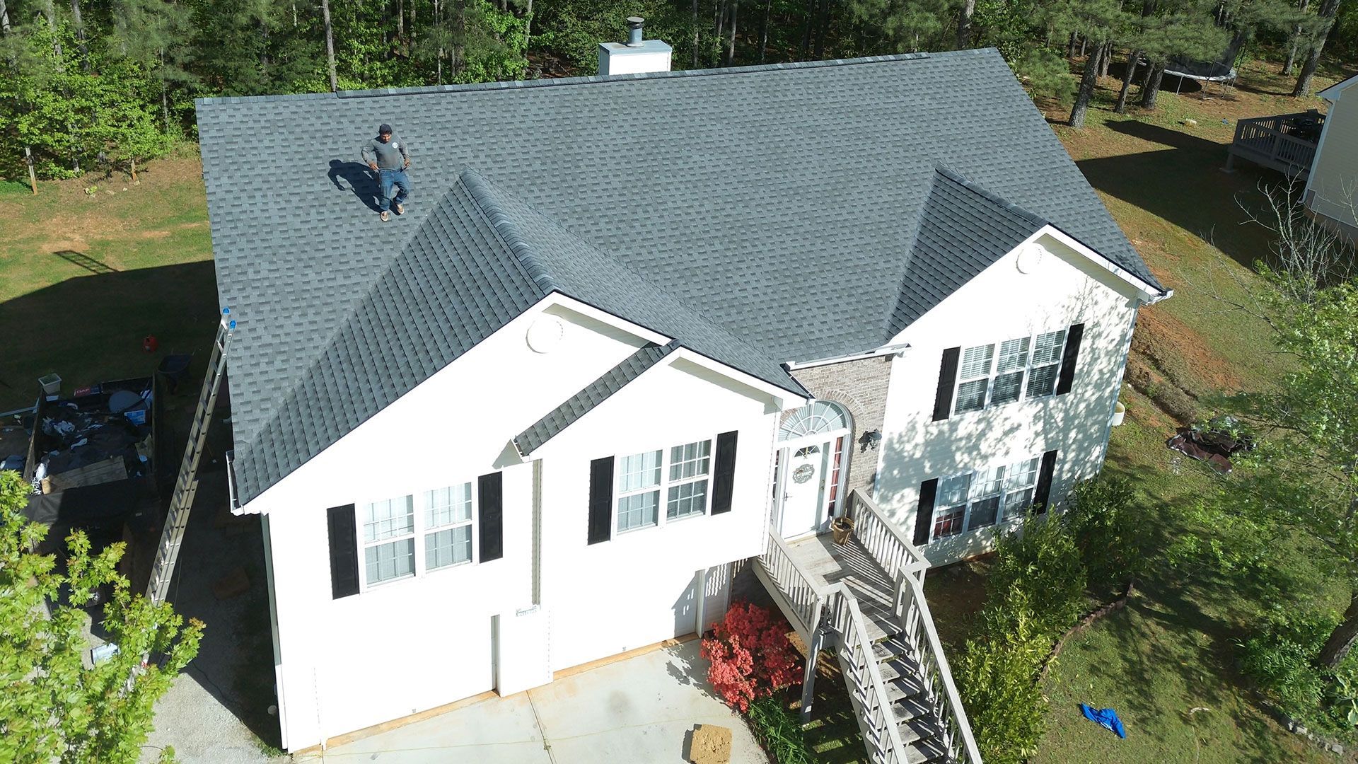 Spartan Roofing Before and After Roofing Job