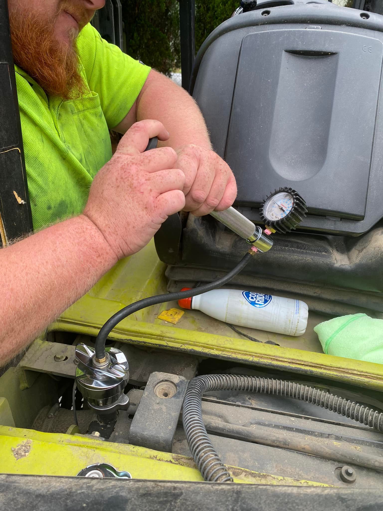 Person Cleaning Equipment on a Cart — Lift It Equipment in Tuggerah, NSW