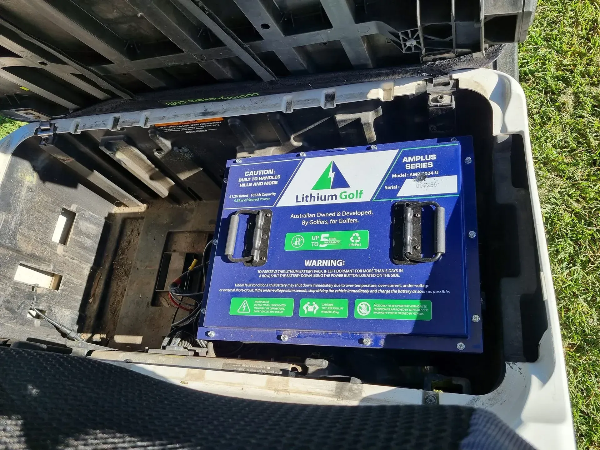 Blue Battery Box With Handle on a Vehicle Bed — Lift It Equipment in Summerland Point, NSW
