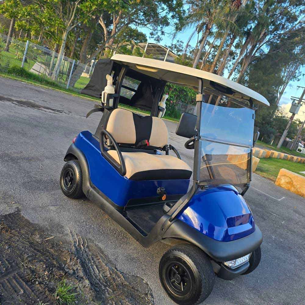 Blue Golf Cart Parked on a Paved Path — Lift It Equipment in Tuggerah, NSW