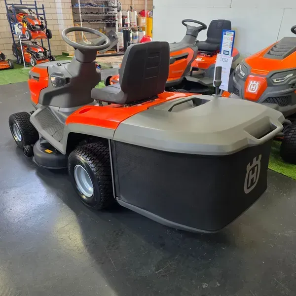 Orange and Gray Riding Lawn Mower in a Showroom — Lift It Equipment in Tuggerah, NSW