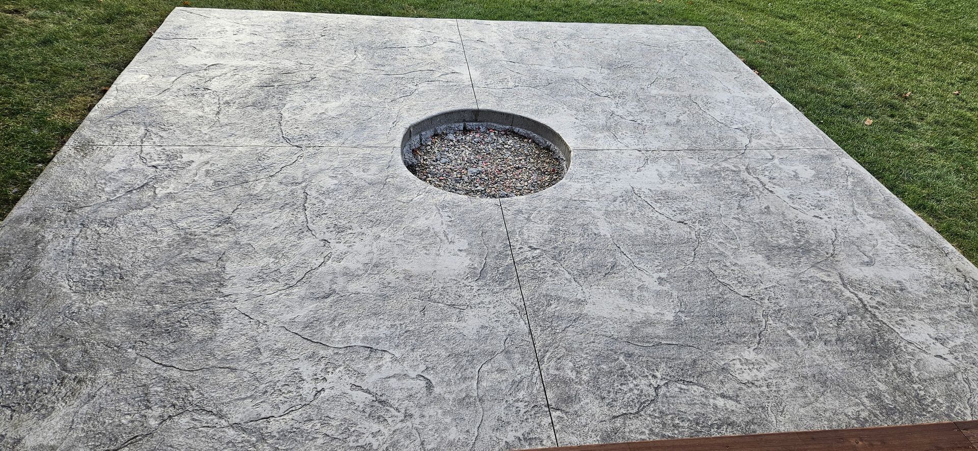 A close up of a concrete floor in a garage.