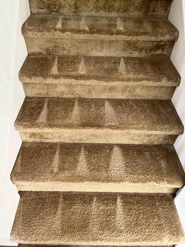 Image of a recently cleaned light brown staircase
