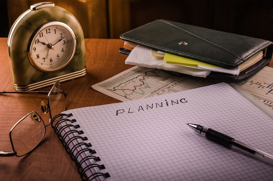 Clock, notebook labeled 